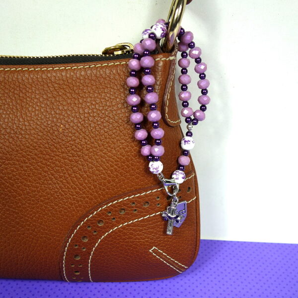 Flowered Purple Prayer Bracelet on Purse